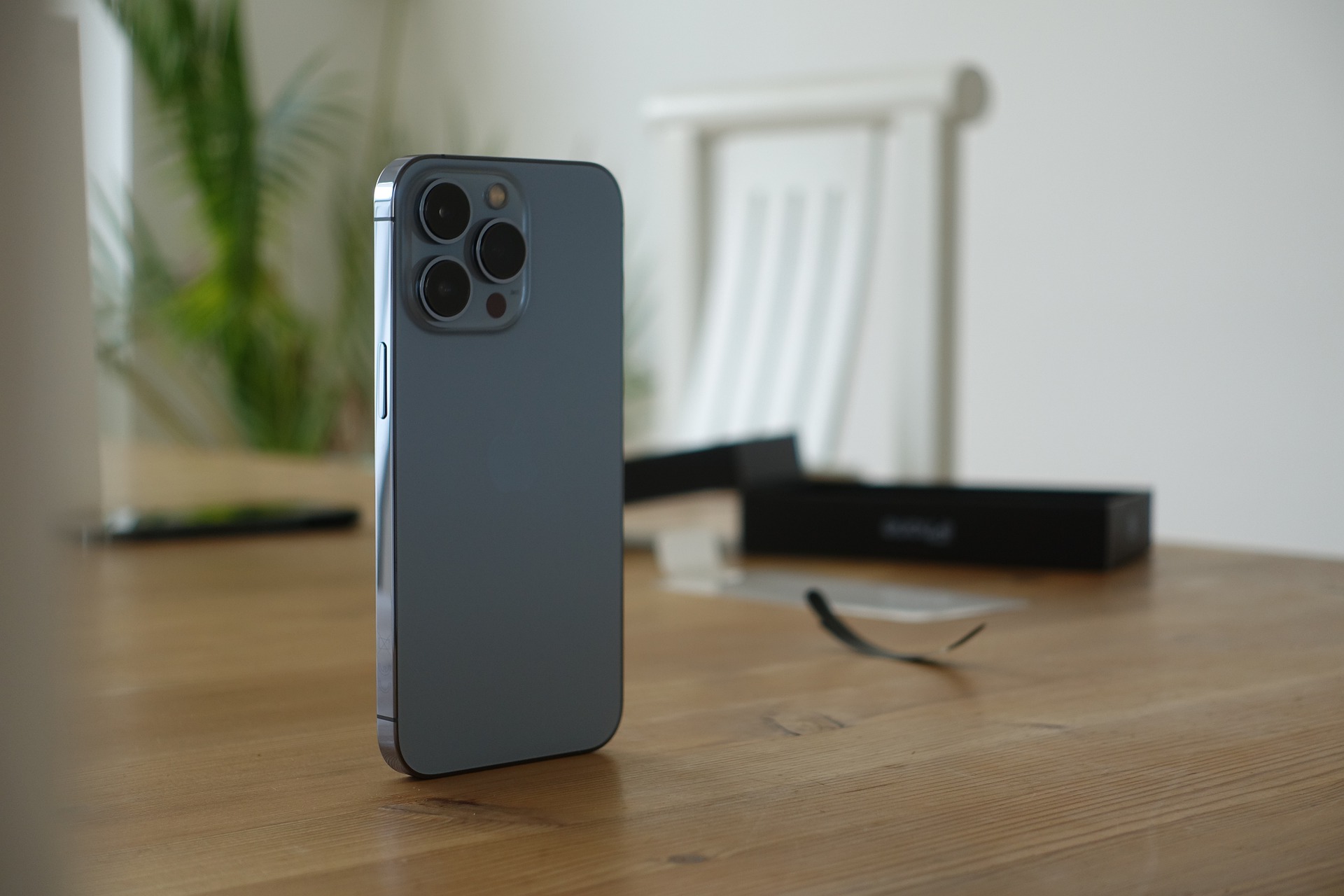 Gray iPhone 13 standing